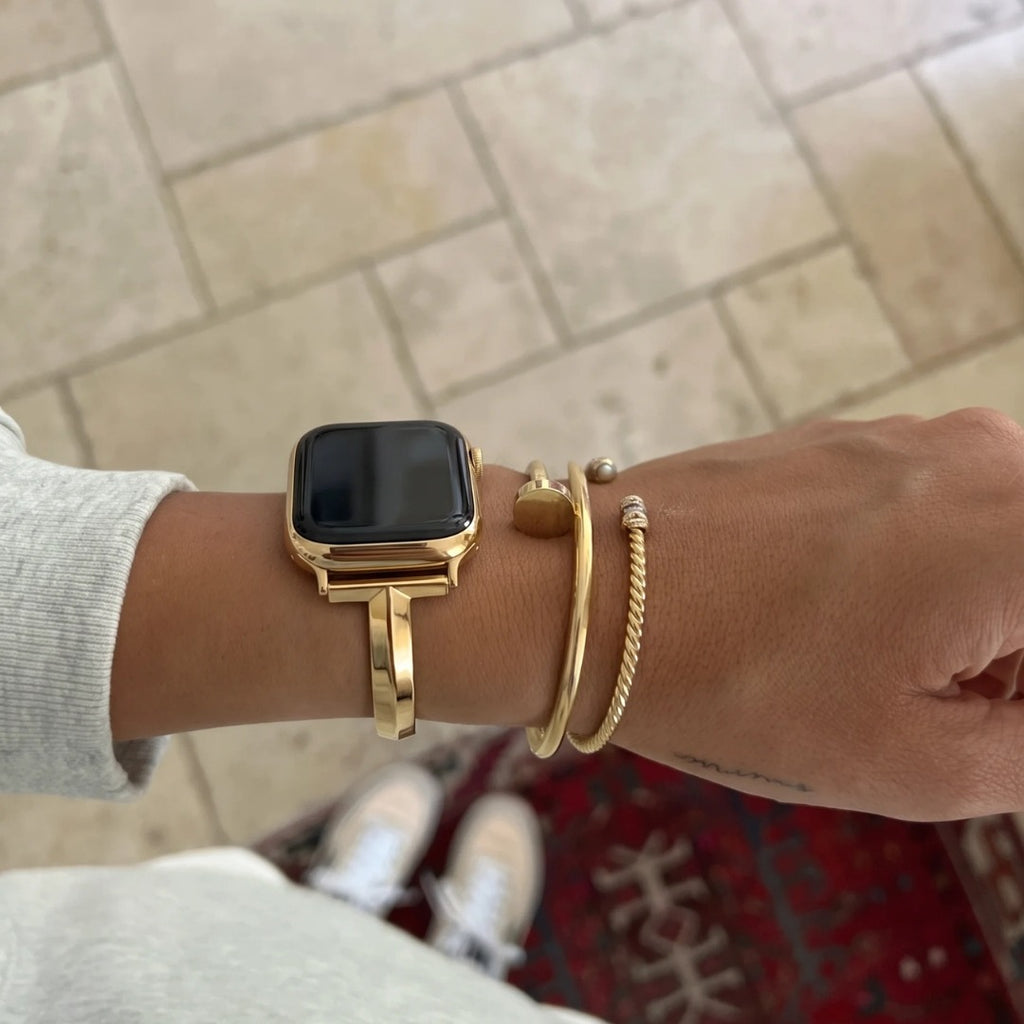 Positano Bangle Band in gold worn on the wrist